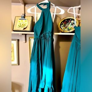 Adorable high neck hi-low dress.  Beautiful floral detail at waist